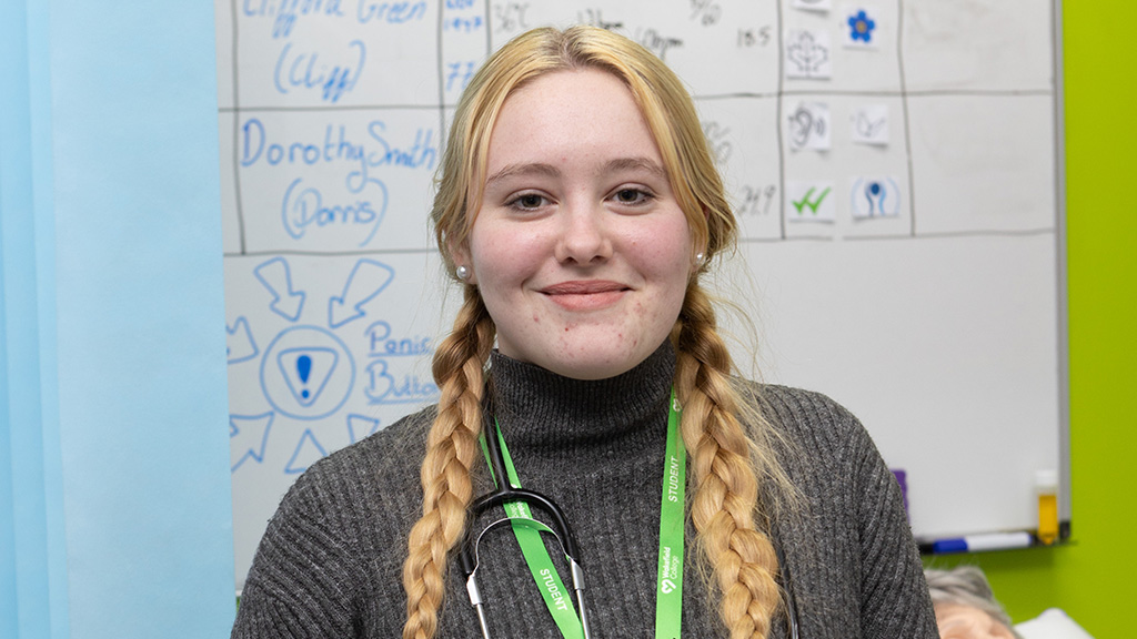 Photo of student in hospital simulation ward