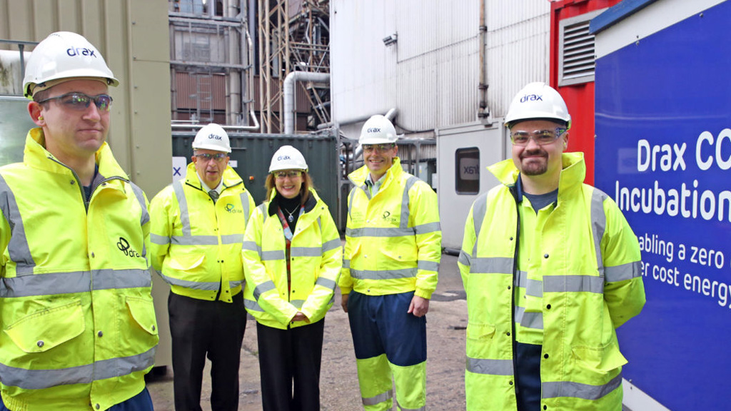 Bruce Heppenstall Drax plant director, Lewis Marron, Drax 4th year apprentice, and Liz Ridley deputy principal at Selby College