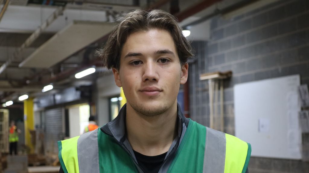 Alfie in the bricklaying workshop 