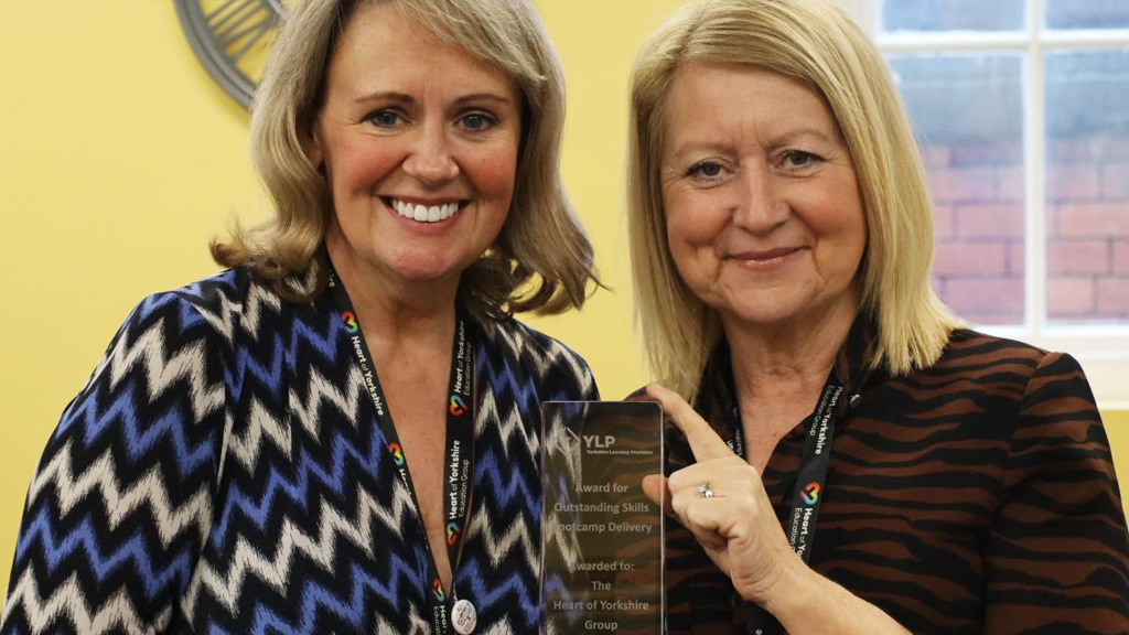 Lorraine Cross and Sam Wright with the YLP award