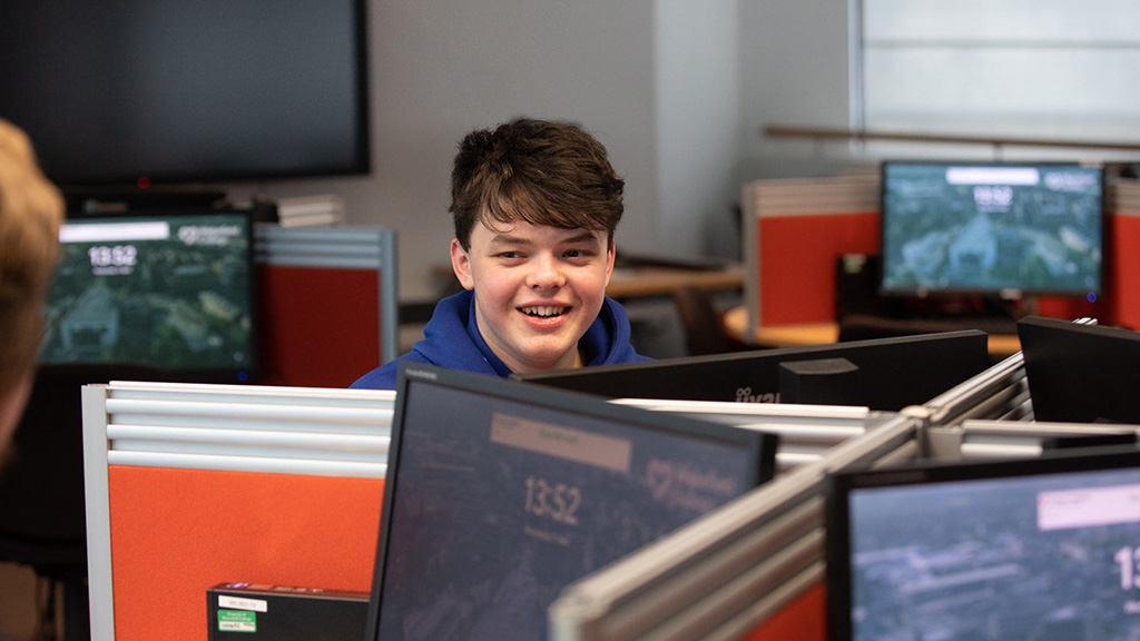 Student using a computer in the library