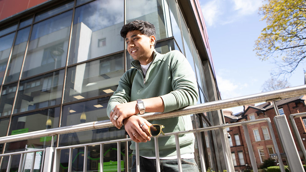 Student looking over railing at Wakefield College