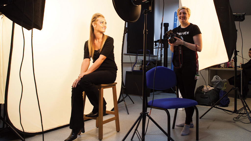 Photography students working in the studio