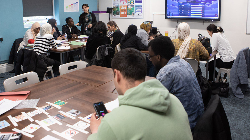 Students in classroom with a teacher