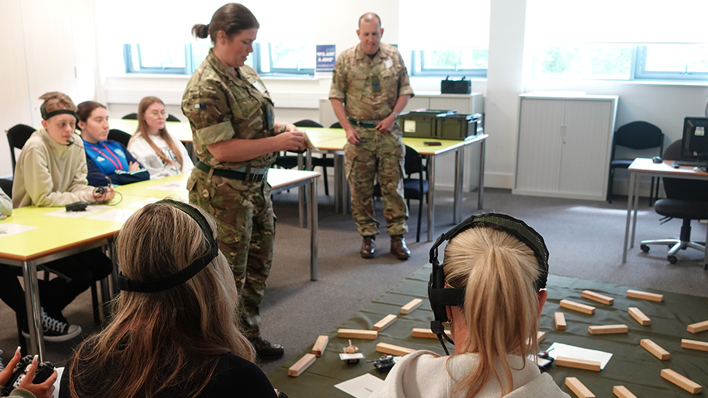 Teacher teaching a class of students